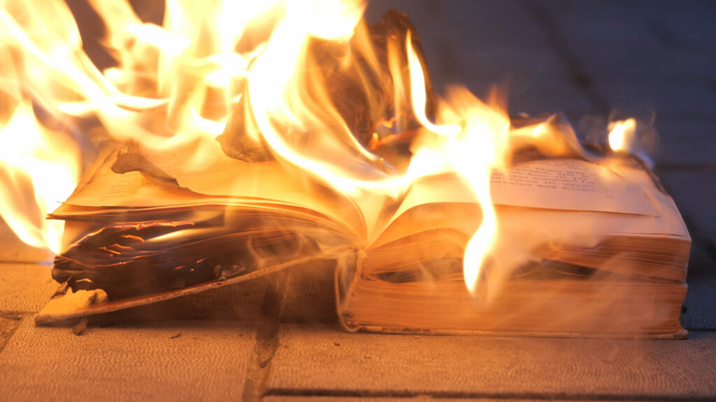 an open book is on fire